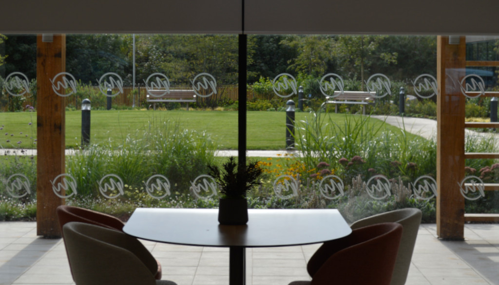 Window film manifestation logo