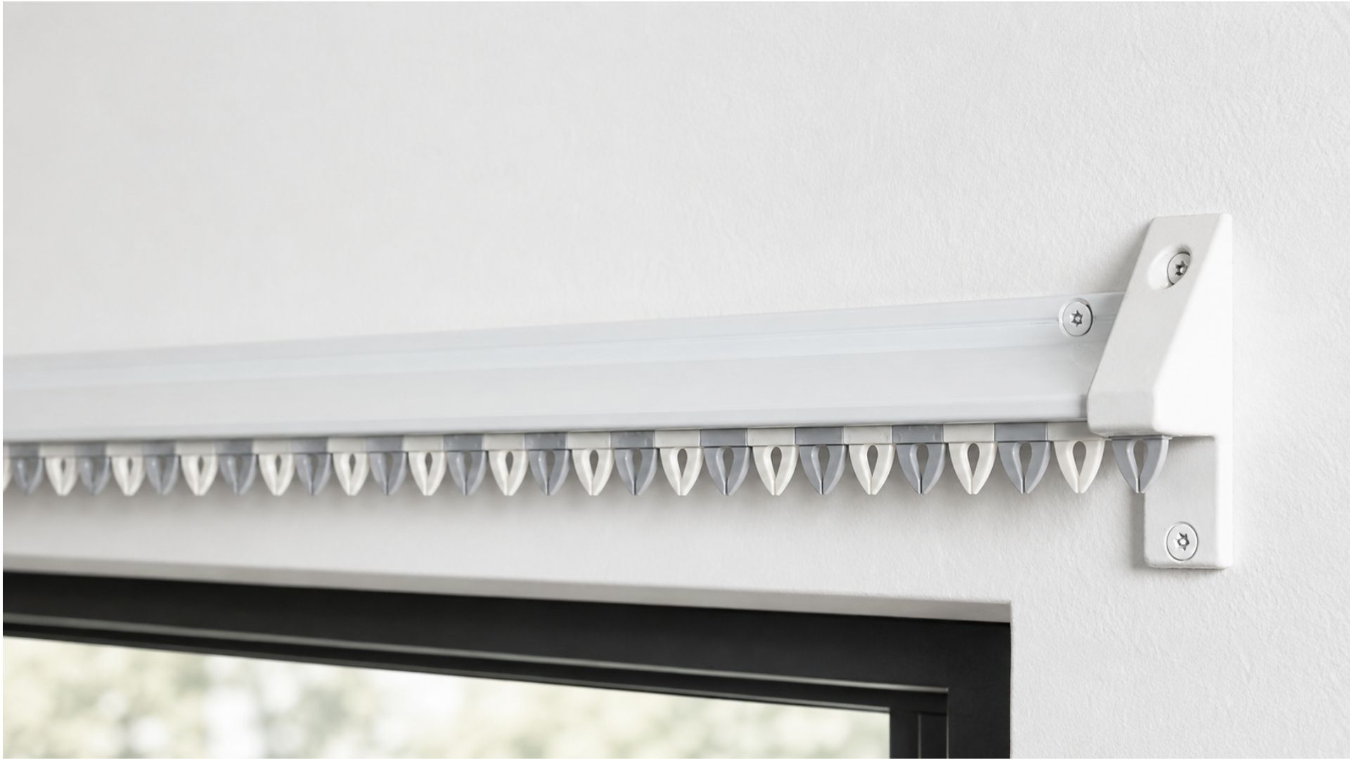 Anti-ligature reduced-ligature curtain track